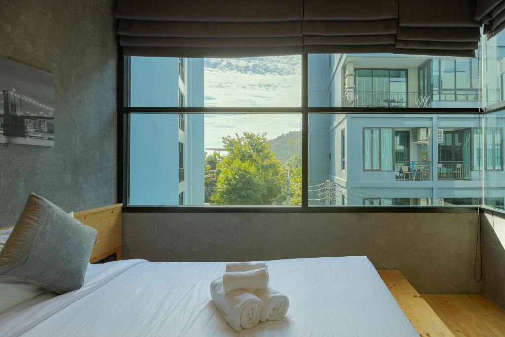 Nai Harn Apartment | Relife Windy by Holy Cow, courtyard view