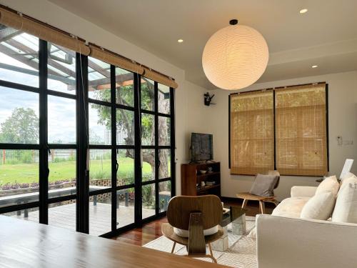 Wat Ket Villa | Riverfront Design Villa w 3 Acre Lawn and River View
