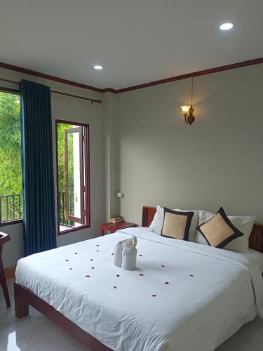 Vang Vieng Hotel | Vang Vieng Champa Resort