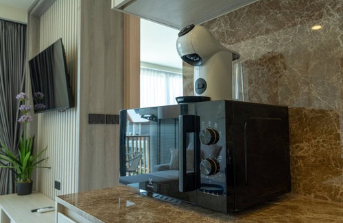 Laguna Apartment | 2-Bedroom Ozone Oasis Apartment, Pool, Gym & Beach Shuttle