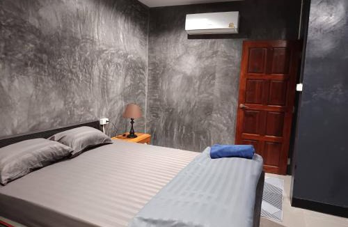 Satun Apartment | Art rock garden