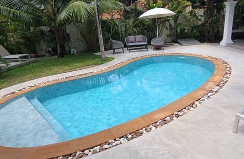 Rawai Villa | Paradise Island Villa 3 features a private swimming pool in a luxurious tropical park.