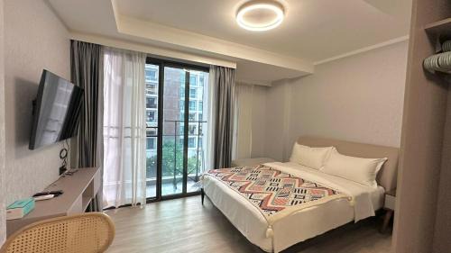 San Sai Apartment | The one condo pool view