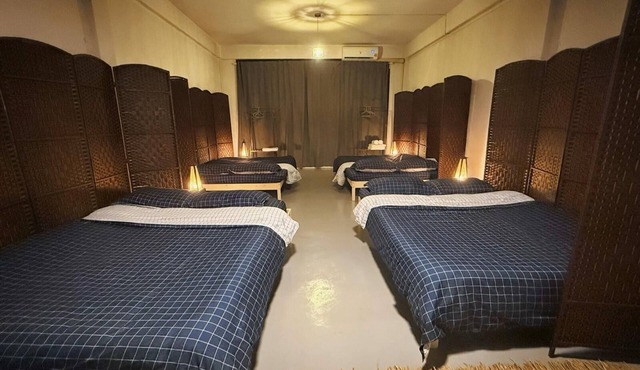 Located at CBD Rama 9. Family room with 4 Double Bed (Share bath)