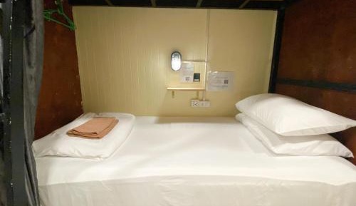 Single Bed in Dormitory Room