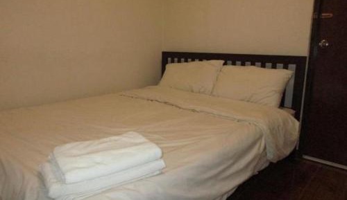 Queen Room with Shared Bathroom
