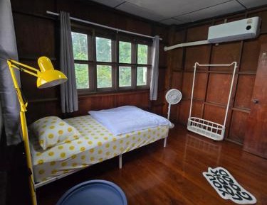 Single Bed in Dormitory Room