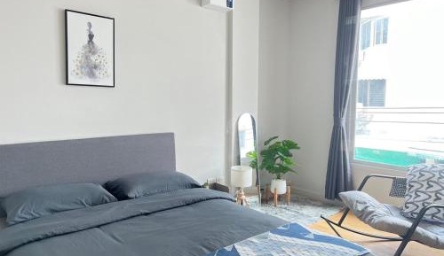 Queen Room with Shared Bathroom