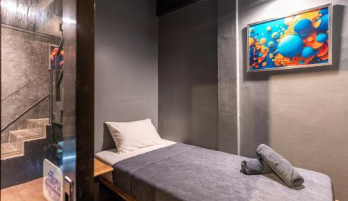 Private Single Bed with Shared Bathroom 
