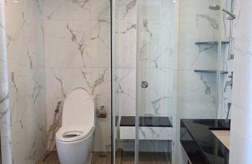 Jomtien Apartment | Luxury Sea View 1BR Rooftop Infinity Pool & Gym